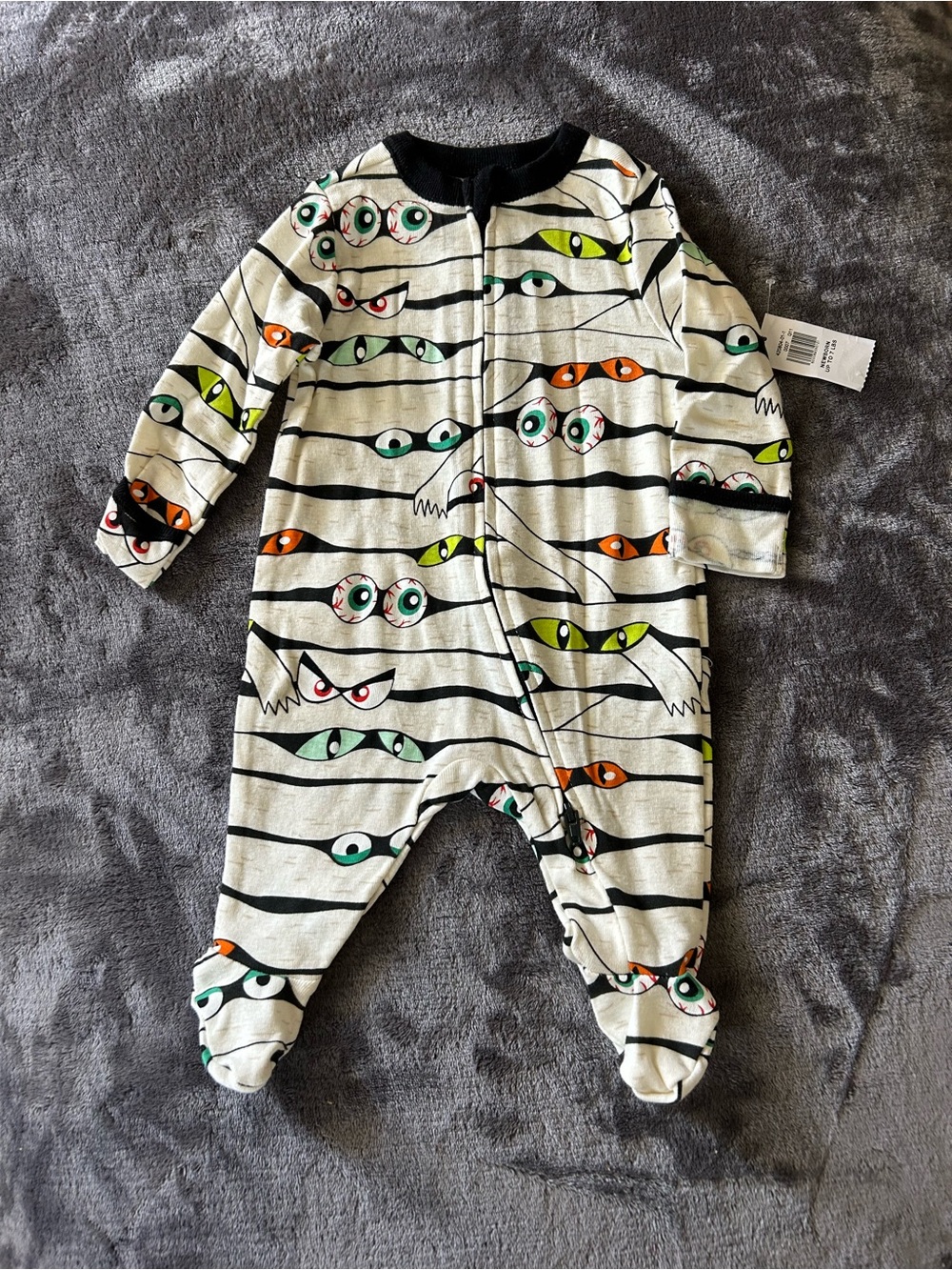 Old Navy Cream Footed One-Piece mummy w/ Multicolor Eye Print newborn up to 7lbs